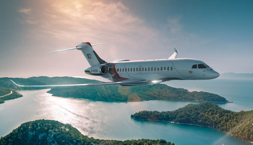 Dassault Falcon 10X flying over water